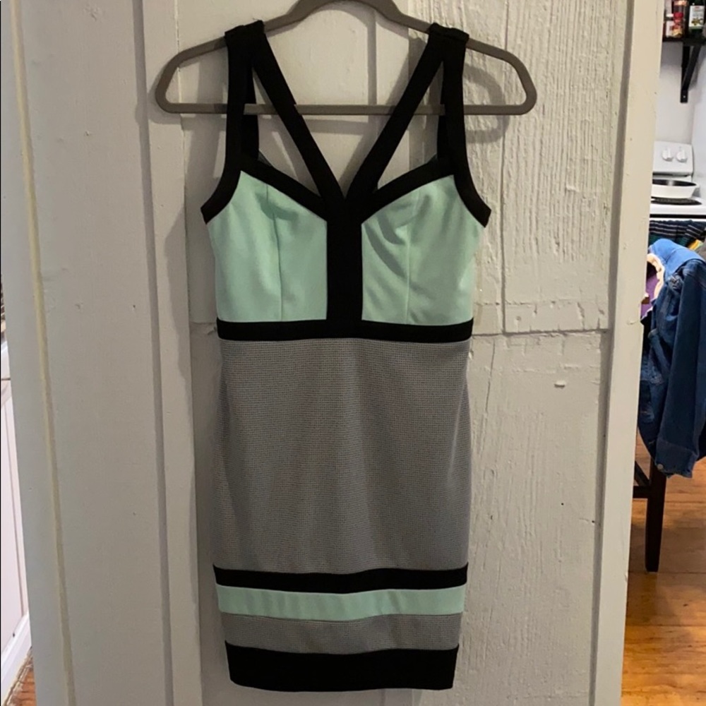 Fitted teal and black dress